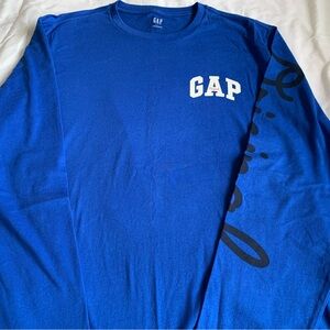 Never worn, GAP men’s large long sleeve shirt color blue has “original” on it.